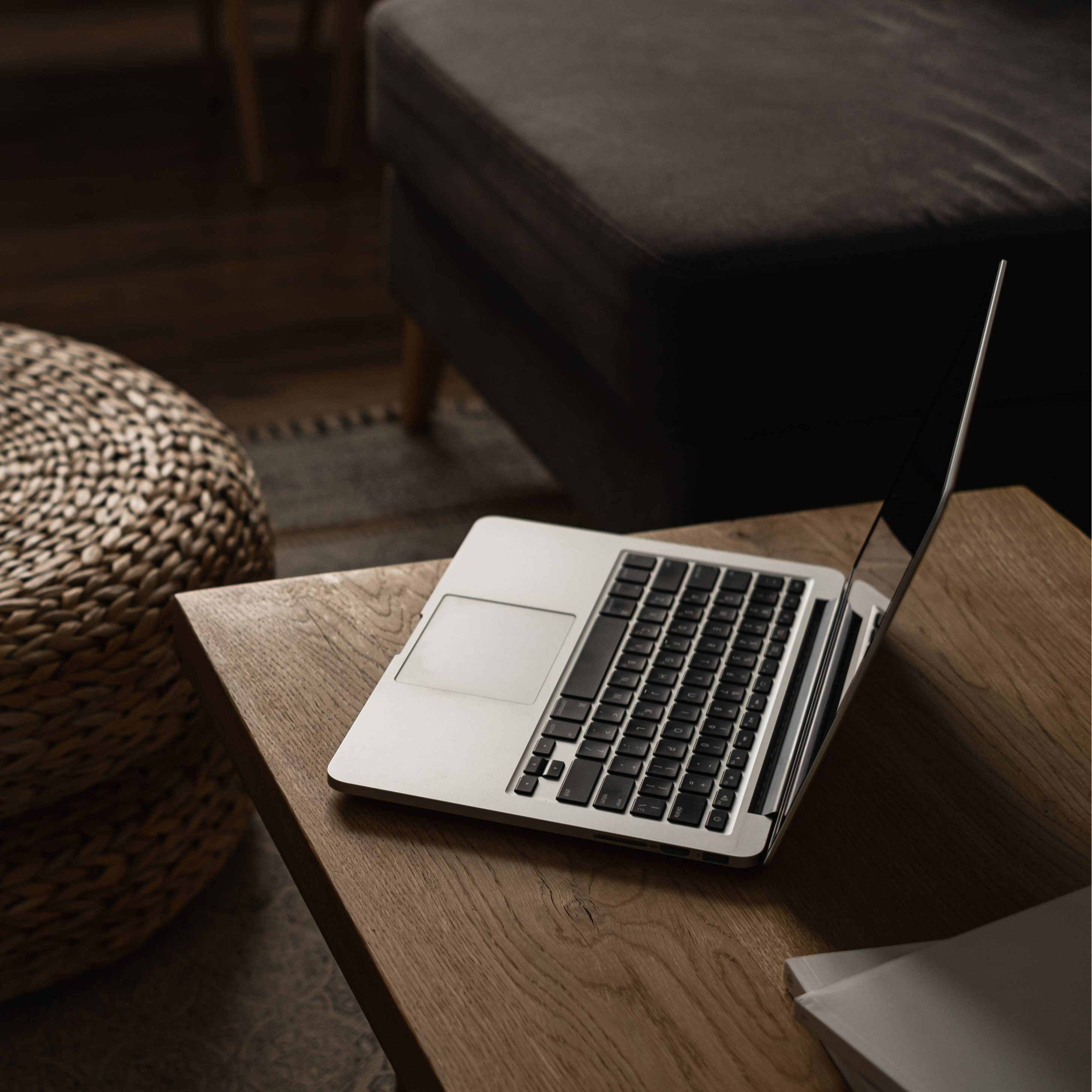 Lap top on table in a dark room