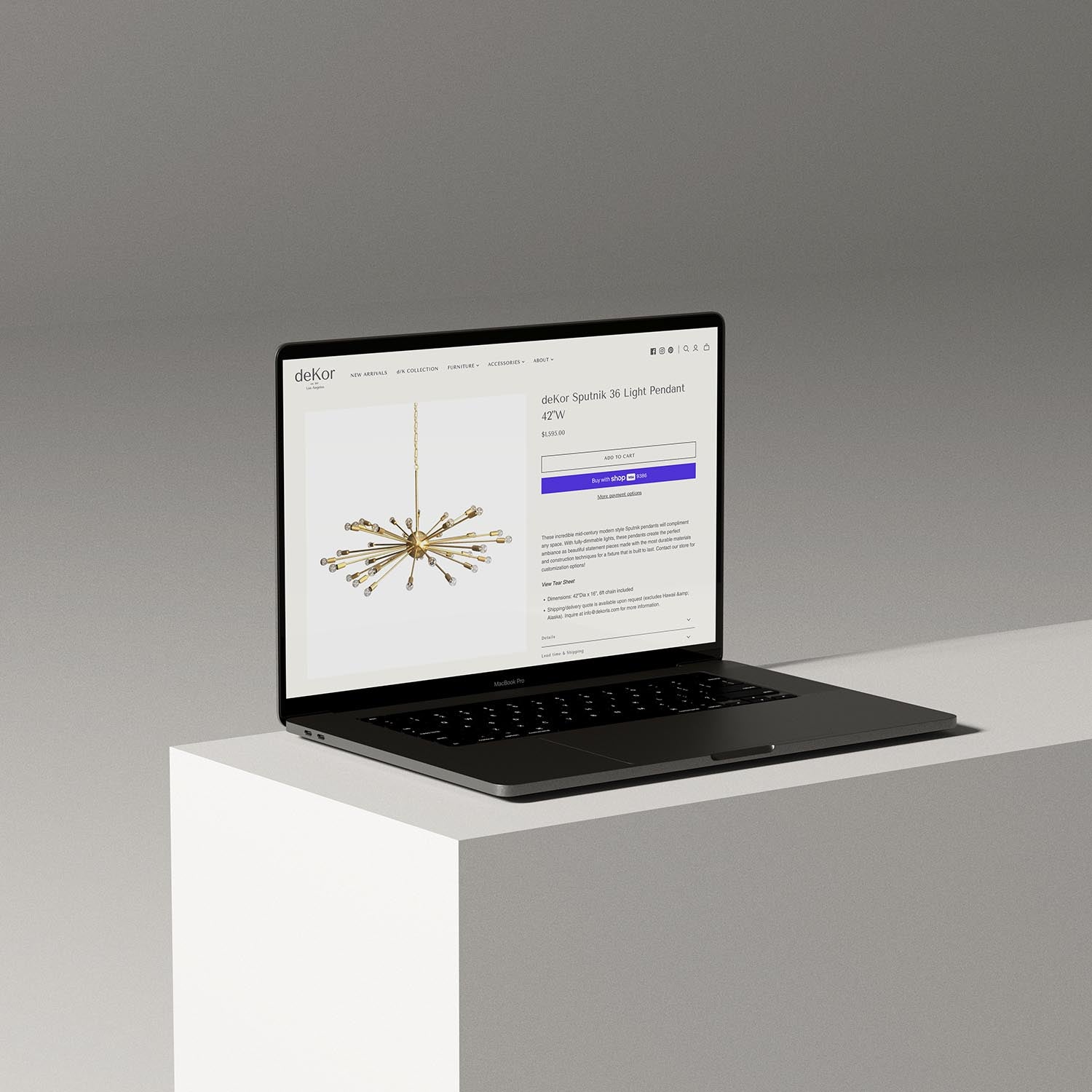 Laptop mockup displaying a custom Shopify product page for a luxury home décor brand.